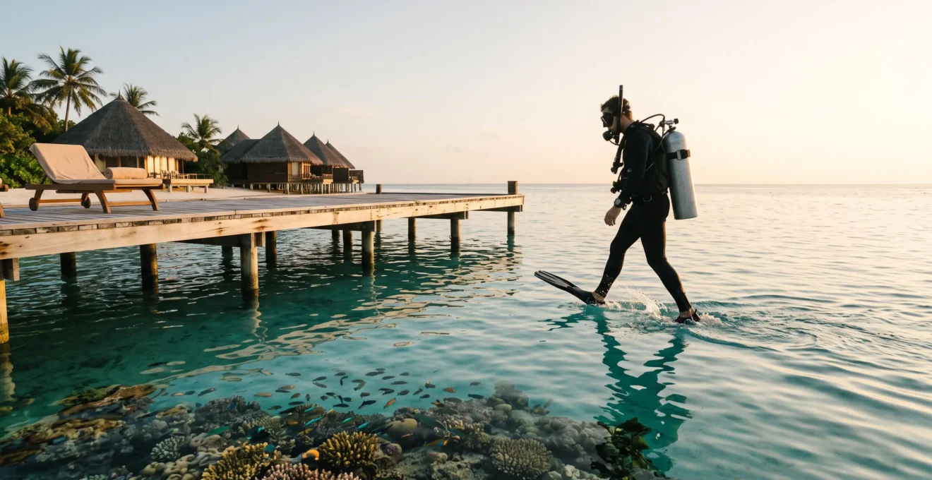 A diver descending from a small boat toward a vivid coral bommie beside a tropical island resort at sunrise, symbolizing the choice between beach leisure and serious reef access.